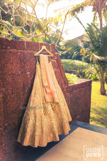 Photo of Peach and pista green bridal lehenga