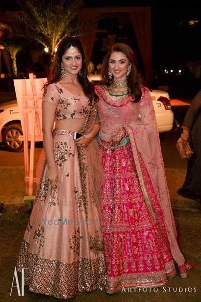 Photo of Bride with her sister in reception