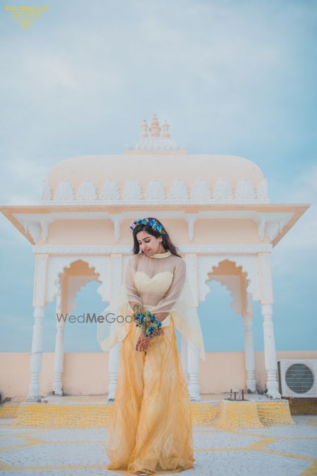 Photo of Simple mehendi look in a yellow fusion outfit