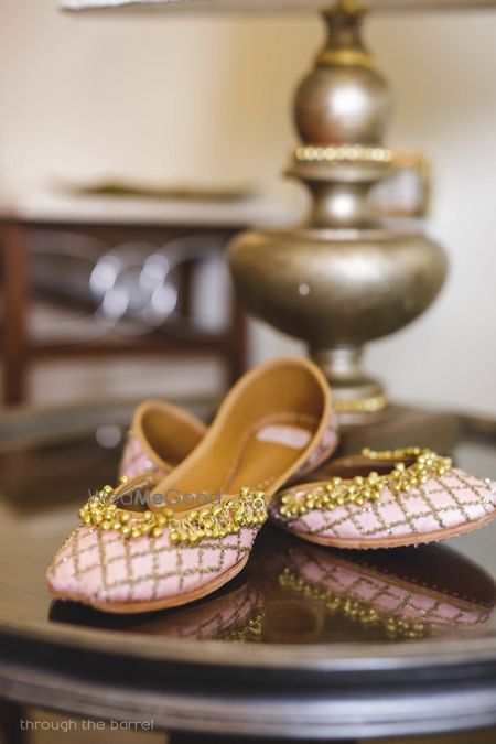 Photo of Matching light pink bridal juttis