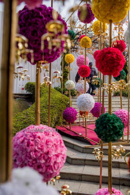 Photo of Colourful mehendi decor idea with colourful origami balls