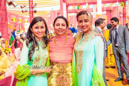 Photo of color coordinated . sisters of the bride