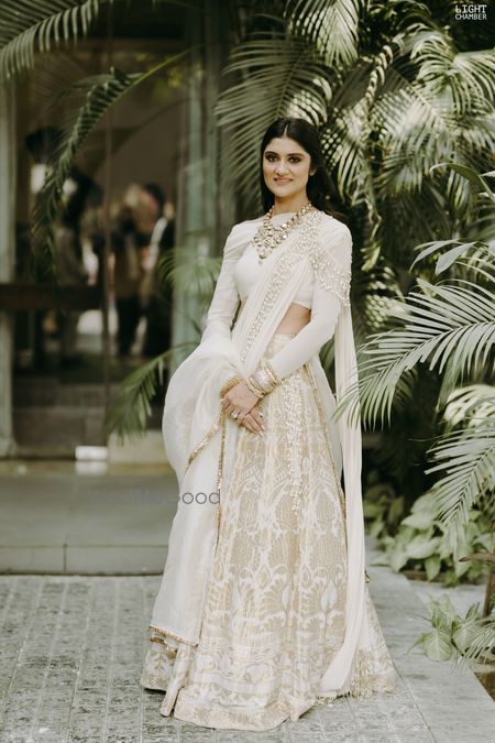 Photo of all white sister of the groom outfits