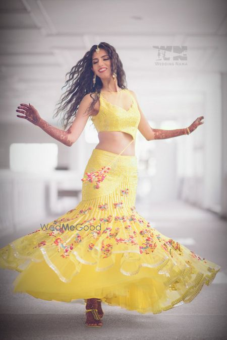 Photo of light yellow indo western lehenga with fishcut detailing