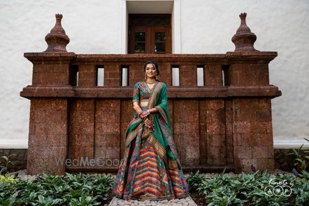 Photo of Bride in traditional mehendi lehenga portrait