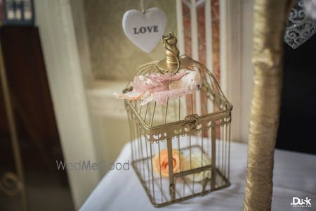 Photo of gold birdcage