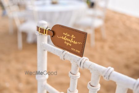 Photo of Luggage tags as favours on chairs