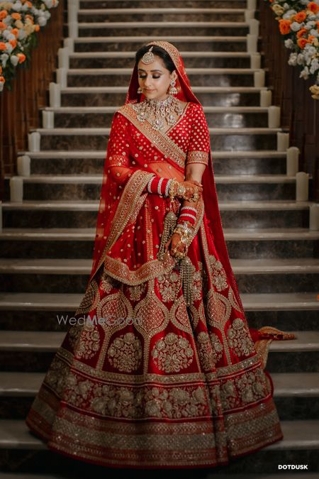 Photo of Bride in a red lehenga