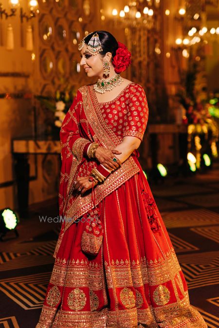 Photo of bride wearing sabyasachi lehenga on her reception