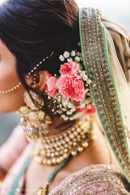 Photo of Pretty bridal bun flowers baby breath