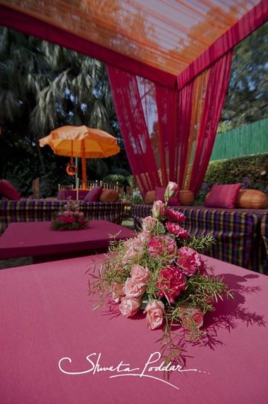 Photo of pink and orange cushions pink and orange drapes pink and orange theme