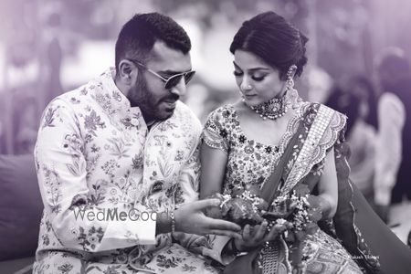 Photo of black and white mehendi couple portrait