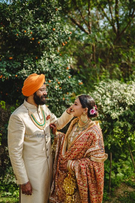 Photo of Bride & groom in a candid moment