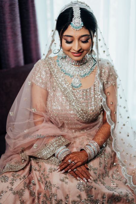 Photo of Pastel pink bridal lehenga