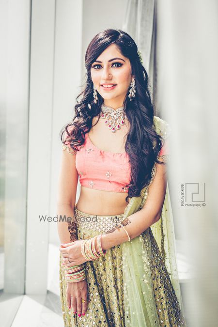 Photo of Sage green and peach lehenga for mehendi