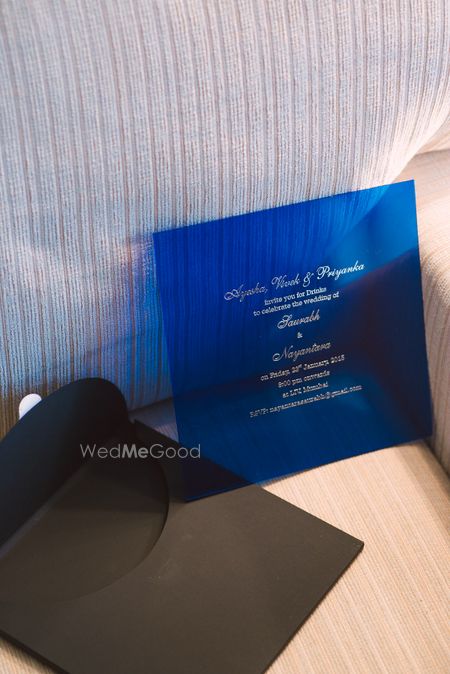 Photo of blue invitation card