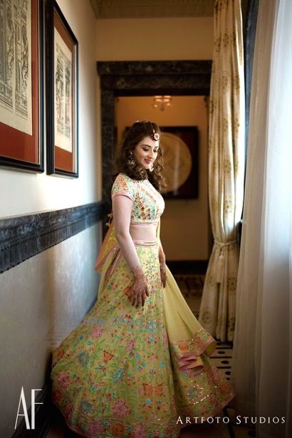 Photo of Yellow mehendi lehenga with floral work