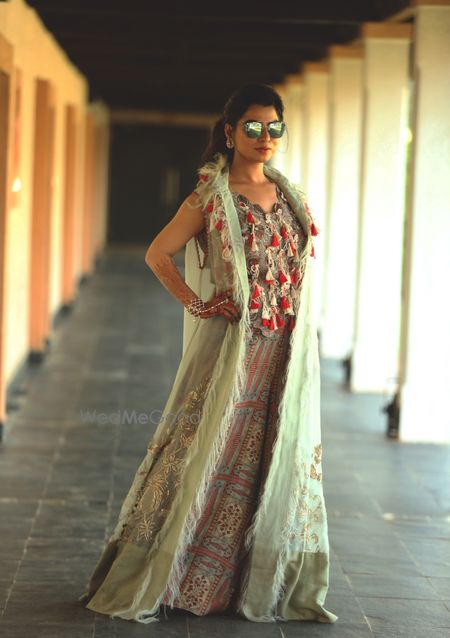 Photo of Indo western outfit for mehendi with tassels