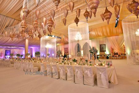 Photo of white and gold wedding decor