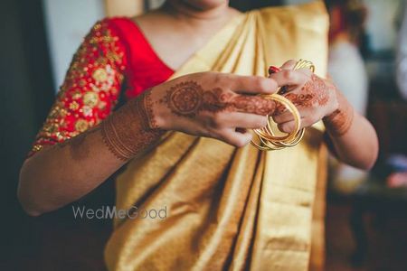 Photo of red and gold saree