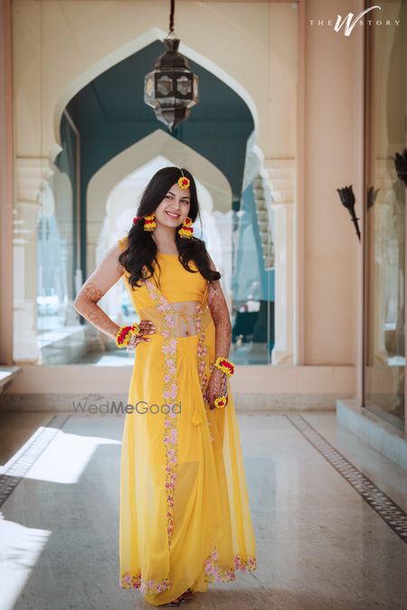 Photo of Bride in a yellow dress for Haldi ceremony.