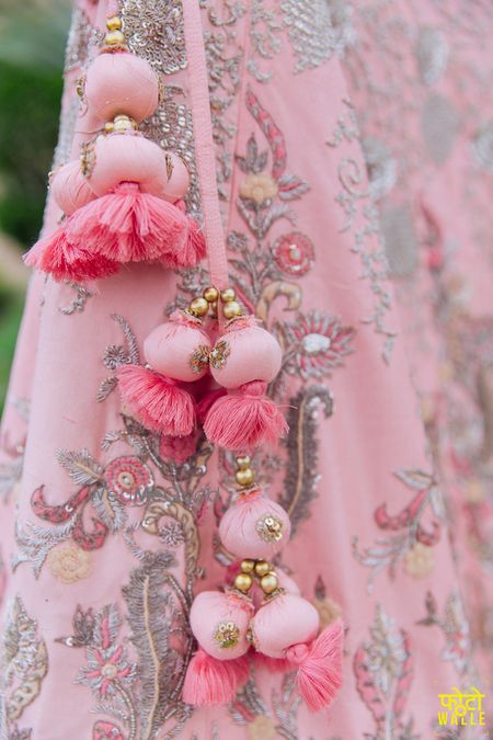 Photo of Light pink lehenga with tassels