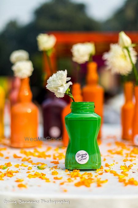 Photo of handpainted bottles as table centerpieces