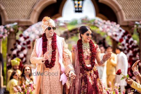 Photo of cool couple photo wearing sunnies post the wedding