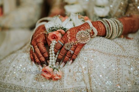 Photo of bridal mehendi with accessories