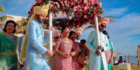 Photo of Bridal entry with matching brothers and wearing sunglasses