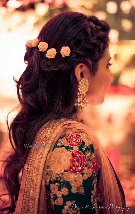 Photo of Half up half down hairstyle with roses