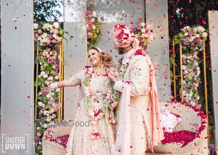 Photo of Wedding day candid couple shot post jaimala