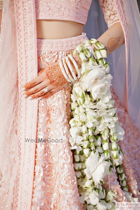 Photo of White and green floral kaleere for bride