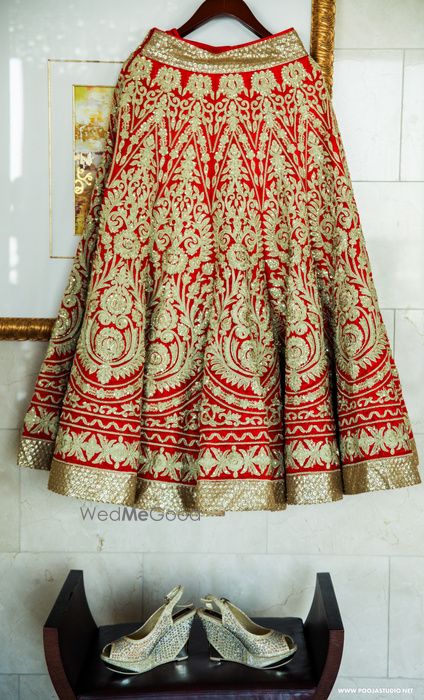 Photo of Red all over embrpidered bridal lehenga