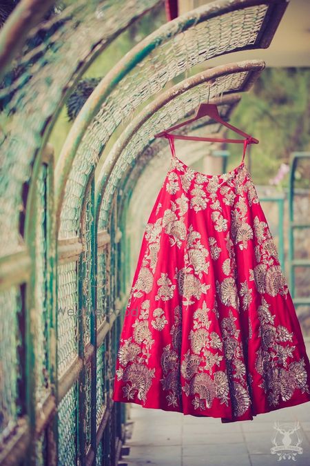 Photo of Red and gold bridal lehenga manish malhotra