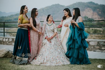 Photo of Bride with her bridesmaids