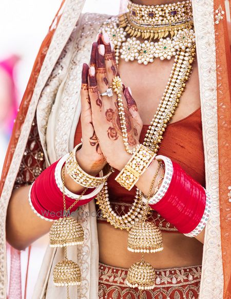 Photo of Bridal haathphool with red choora