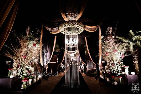 Photo of glamorous black and gold cocktail theme with drapes