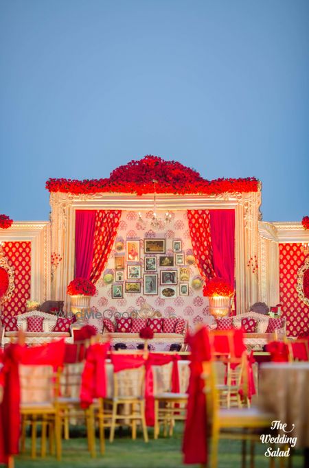 Photo of Unique wedding decor with red and gold theme