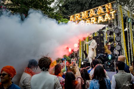 Photo of Grand baraat with the groom dancing