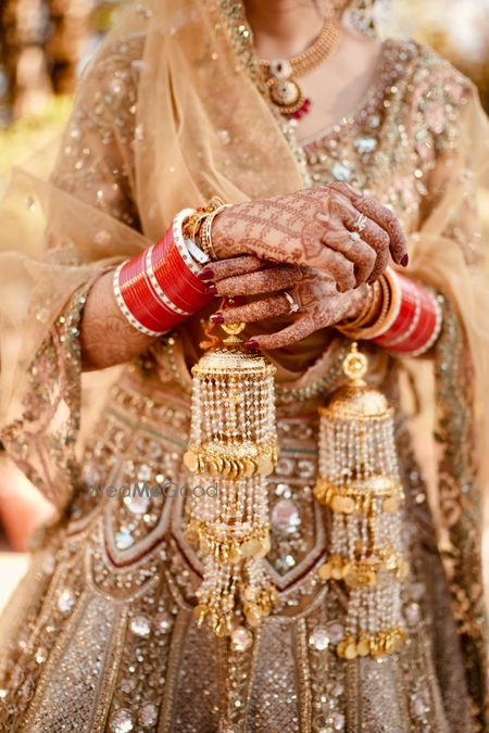 Photo of Bride Wearing Golden Kaleerein