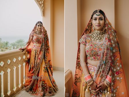 Photo of offbeat bridal look in an orange floral print lehenga