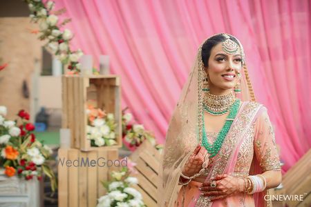 Photo of Green jewellery with peach lehenga