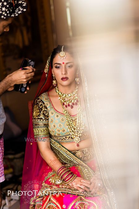 Photo of Mint and pink bridal lehenga