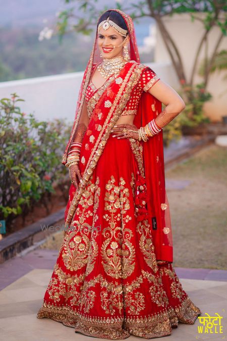 Photo of Red sabyasachi bridal lehenga