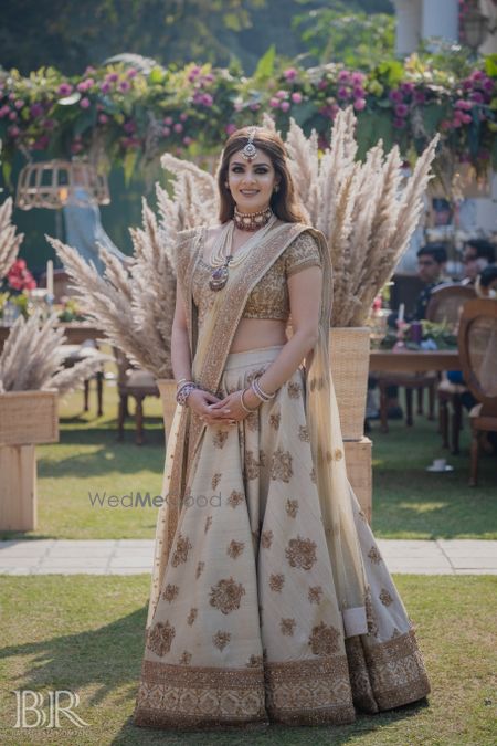 Photo of sister of the bride in a beige outfit