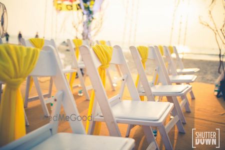 Photo of Yellow and white chairs