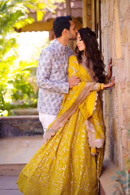 Photo of Mehendi yellow scalloped edge lehenga