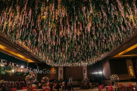 Photo of Grand engagement decor idea with floral ceiling