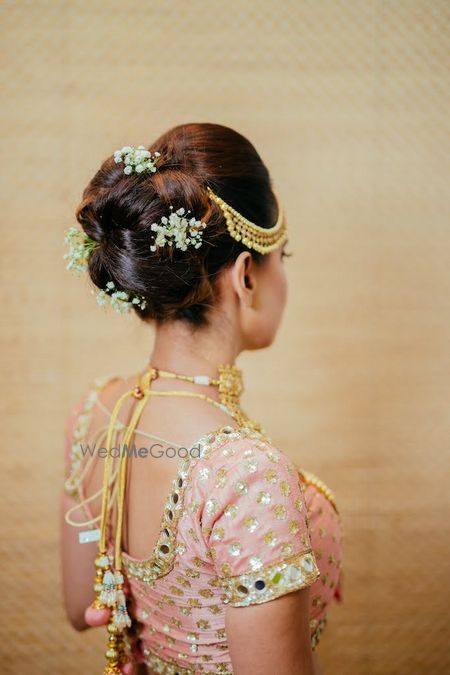 Photo of Simple bridal bun with babys breath